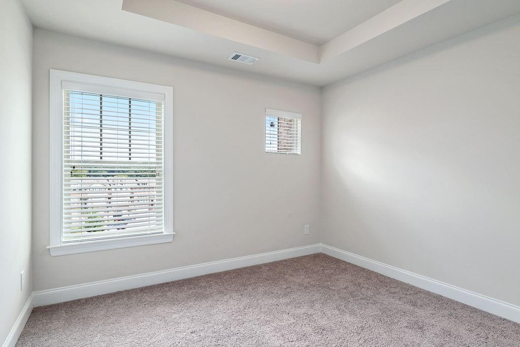 1395 Harris Way Street Brookhaven, GA 30319 - Photo 18 of 28 an empty room with a window