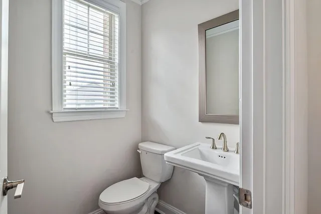 a bathroom with a sink and a toilet