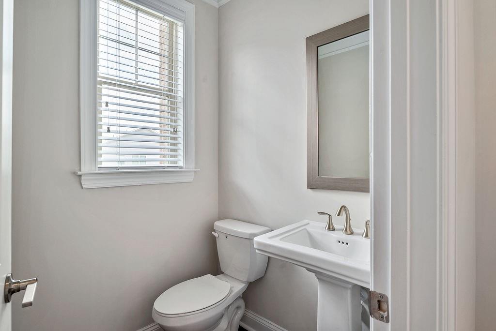 1395 Harris Way Street Brookhaven, GA 30319 - Photo 6 of 28 a bathroom with a sink and a toilet