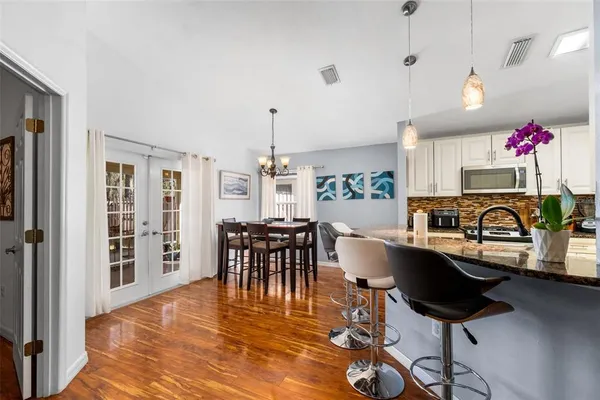 a view of a dining room with furniture