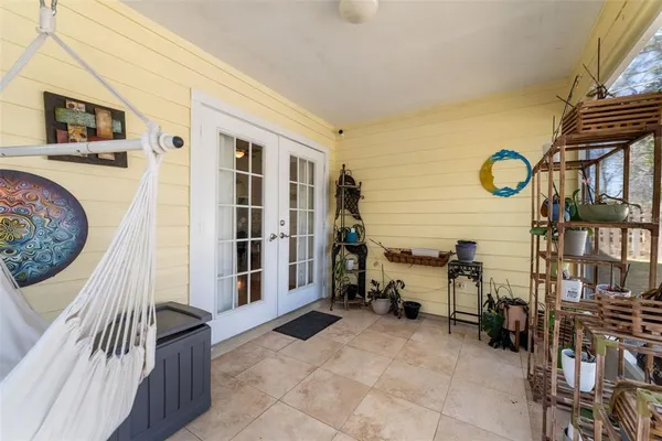 a view of livingroom with furniture and front door