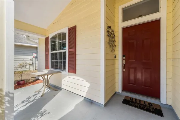 a living room with furniture and windows
