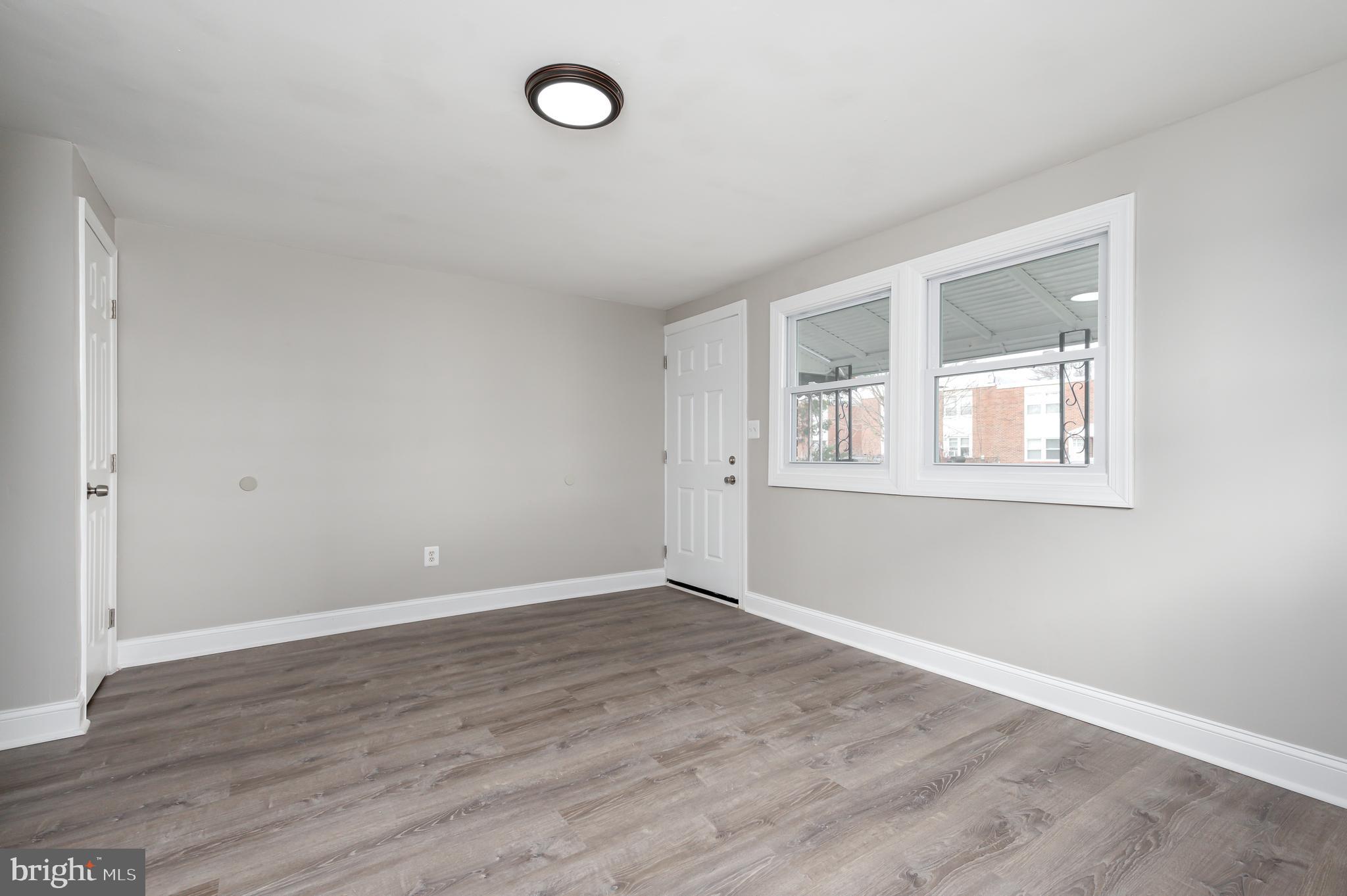 7923 Eastdale Road Baltimore, MD 21224 - Photo 7 of 27 Bright and Inviting Living Space