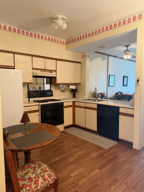 337 Mill Street, Unit 337 Batavia, IL 60510 - Photo 3 of 12 a kitchen with stainless steel appliances granite countertop a sink and a stove
