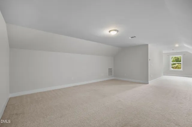 an aerial view of residential house with parking space