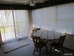 2880 North Lakeshore Road Port Hope, MI 48468 - Photo 6 of 8 Dining room overlooks lake.jpg