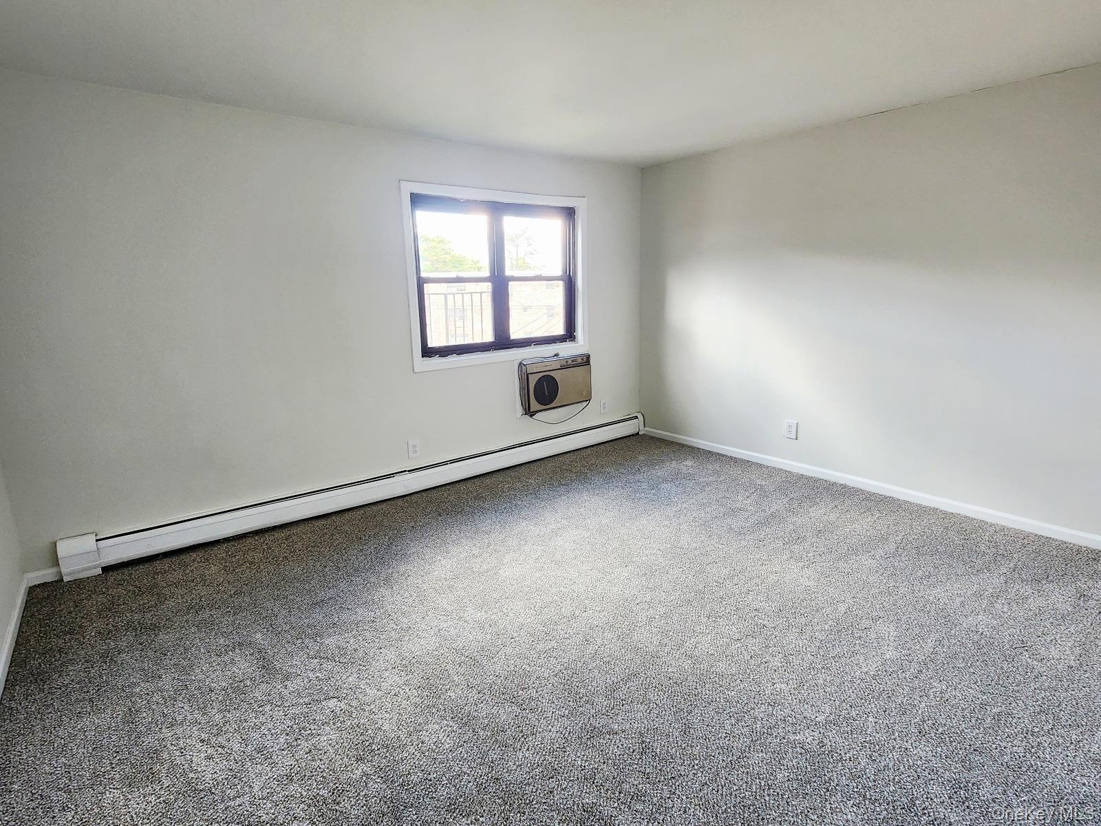 112 Union Road, Unit 3L Spring Valley, NY 10977 - Photo 11 of 19 an empty room with windows