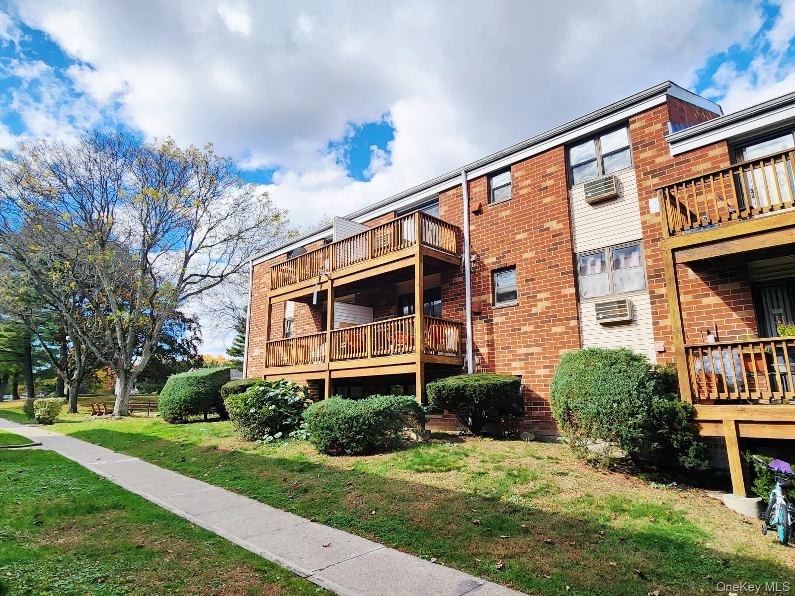 112 Union Road, Unit 3L Spring Valley, NY 10977 - Photo 18 of 19 a front view of a house with garden