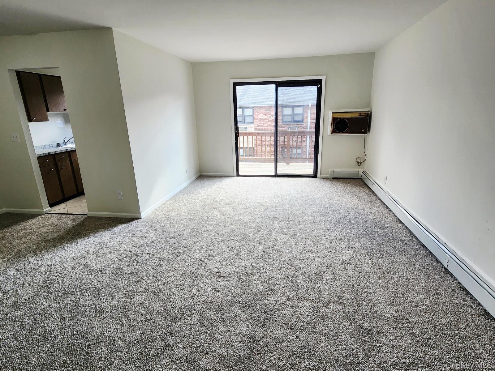 112 Union Road, Unit 3L Spring Valley, NY 10977 - Photo 4 of 19 an empty room with windows