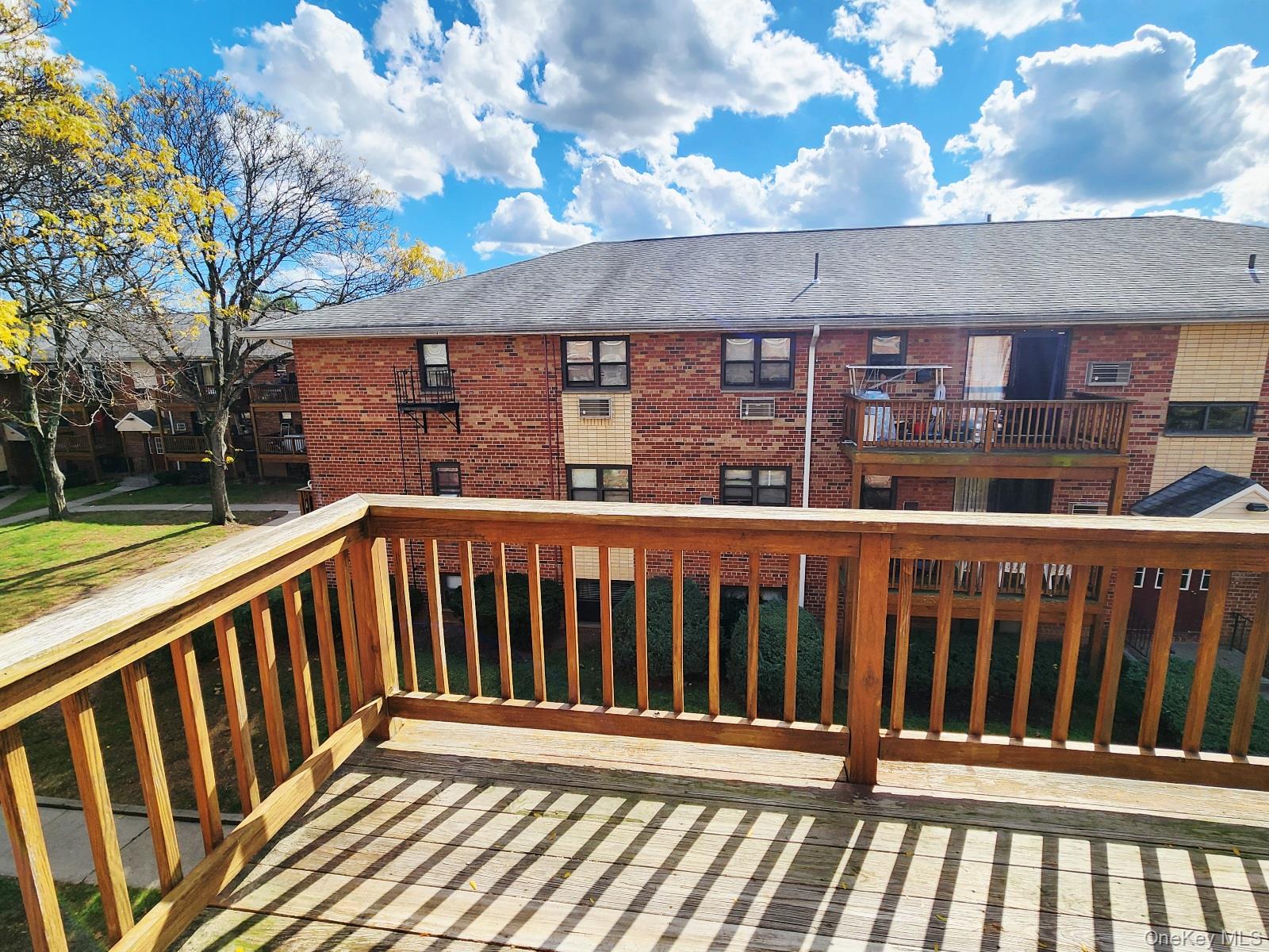 112 Union Road, Unit 3L Spring Valley, NY 10977 - Photo 5 of 19 a view of outdoor space with deck and a yard