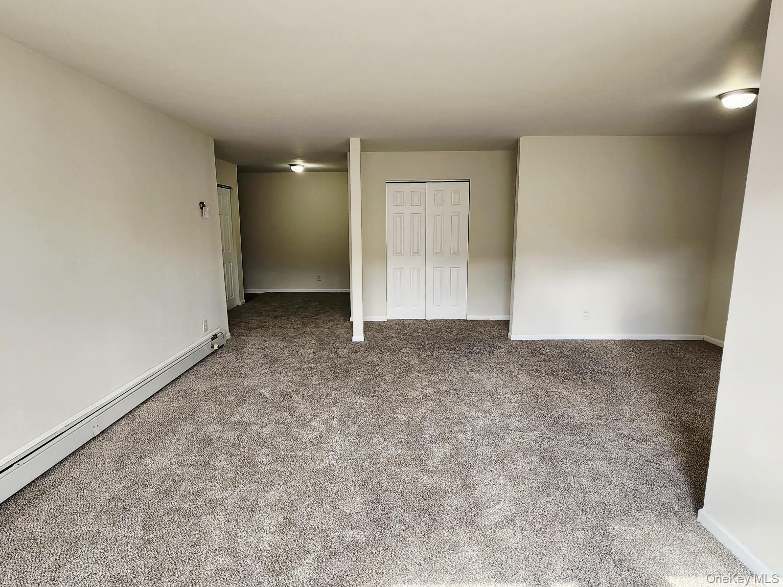 112 Union Road, Unit 3L Spring Valley, NY 10977 - Photo 7 of 19 an empty room with a natural light