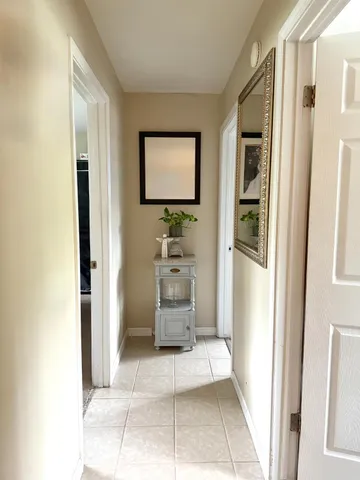 a bathroom with a sink a toilet and a window