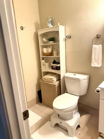 a green field with lots of trees