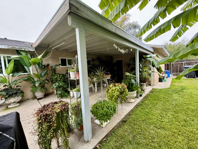 a view of a porch with a yard
