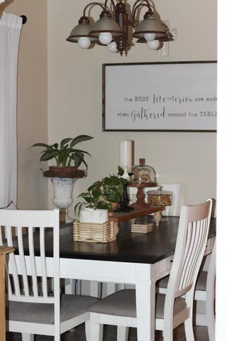 a kitchen with stainless steel appliances a stove a sink and a microwave