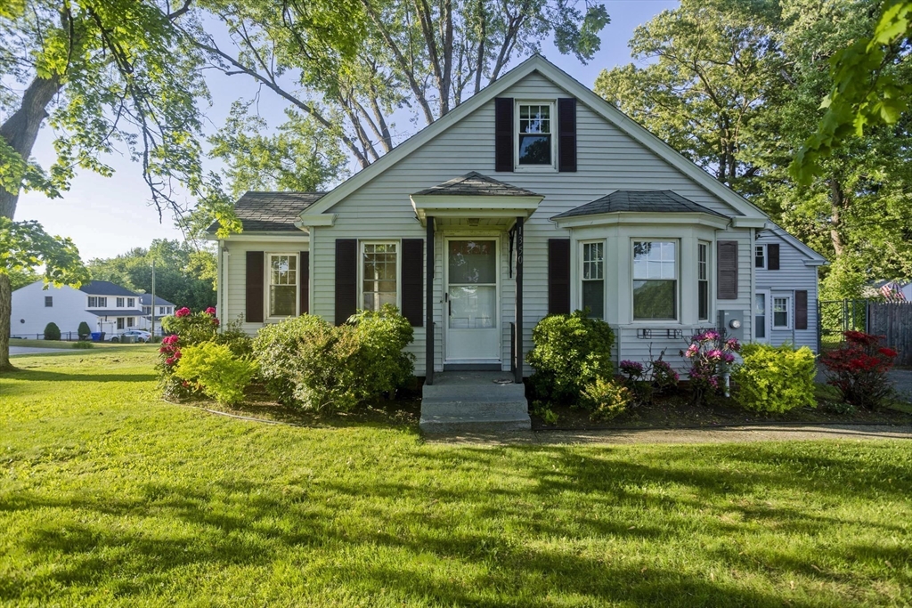 1350 Wilbraham Road Springfield, MA 01119 - Photo 2 of 35 a front view of a house with garden