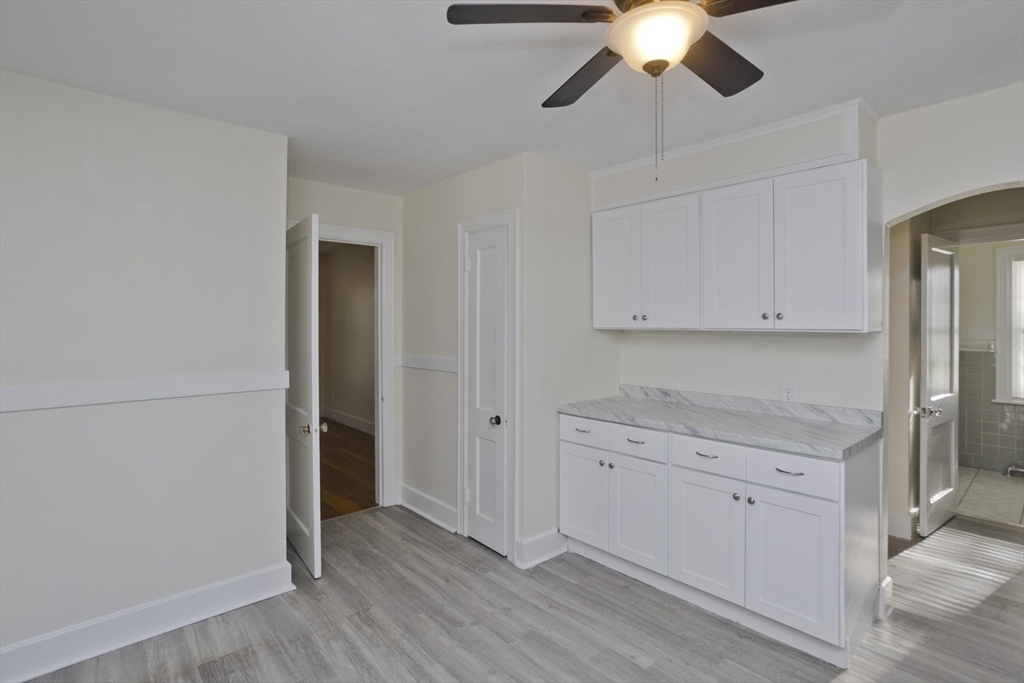 1350 Wilbraham Road Springfield, MA 01119 - Photo 8 of 35 a view of cabinets and wooden floor