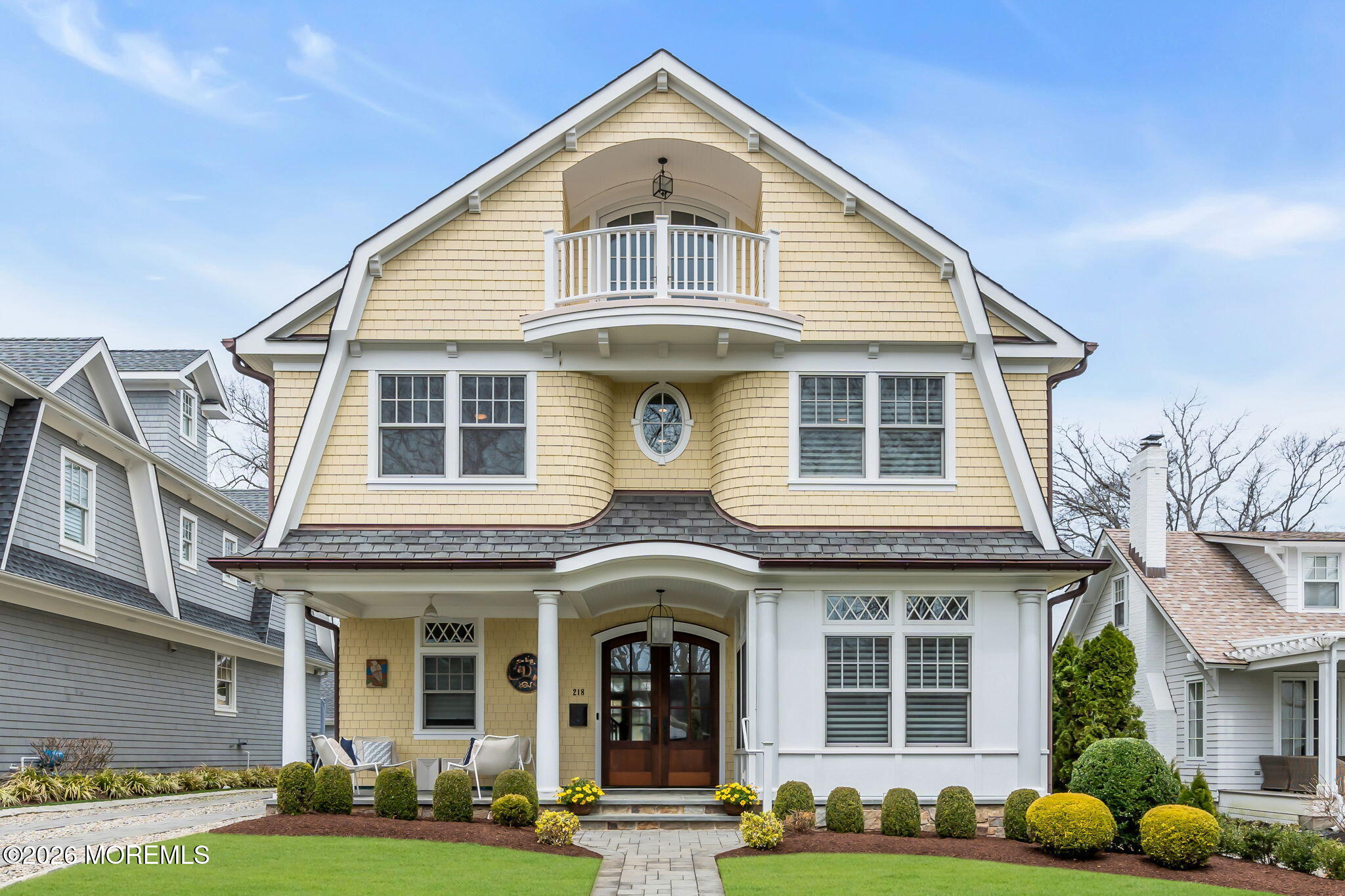 218 Worthington Avenue Spring Lake, NJ 07762 - Photo 1 of 51 a front view of a house with garden