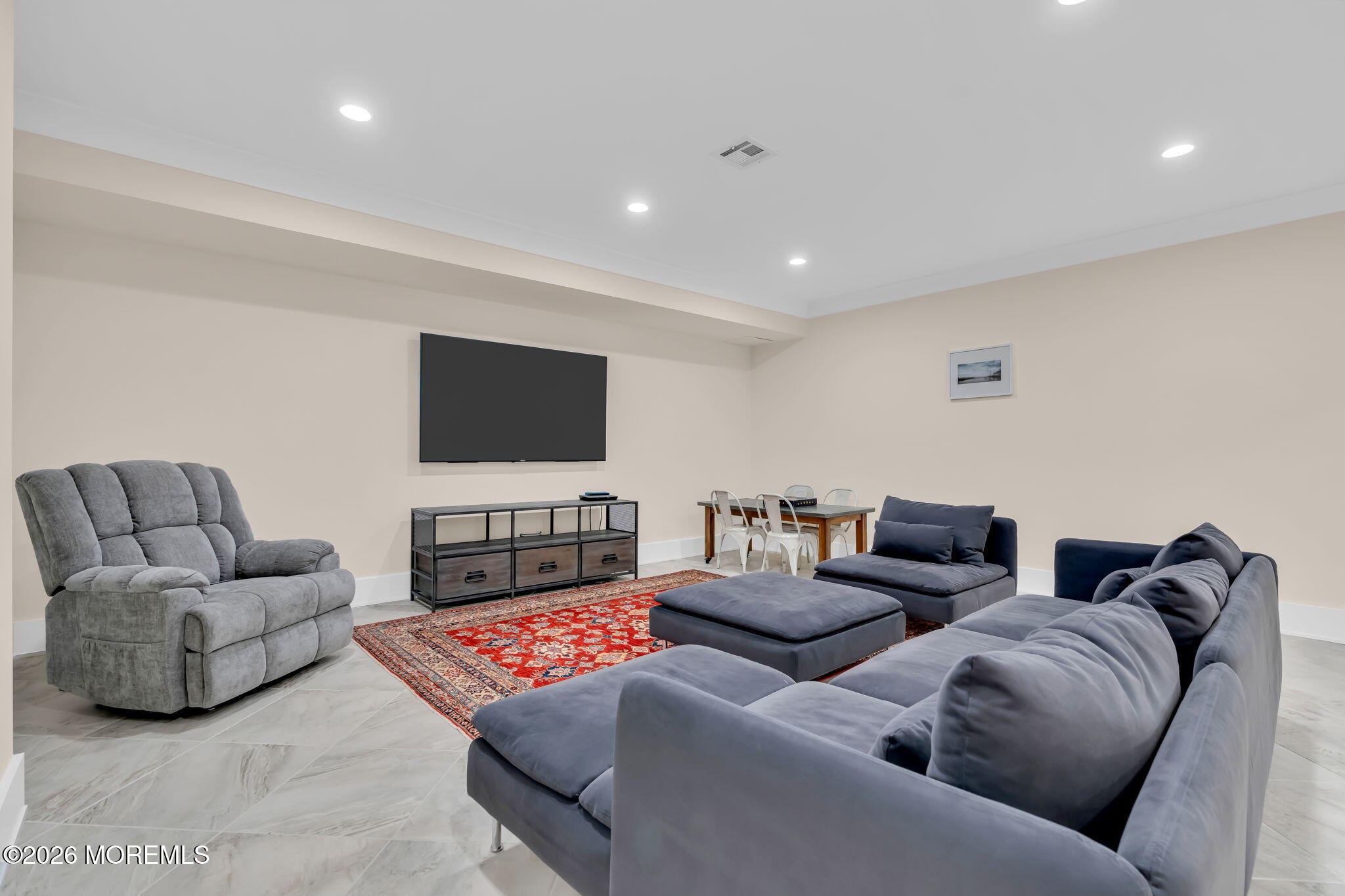 218 Worthington Avenue Spring Lake, NJ 07762 - Photo 38 of 51 a living room with furniture and a flat screen tv