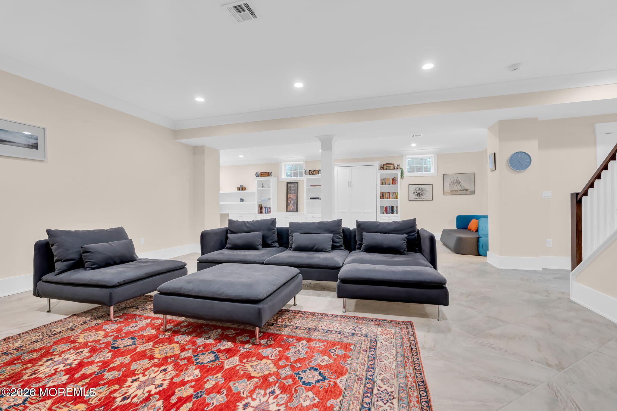 218 Worthington Avenue Spring Lake, NJ 07762 - Photo 39 of 51 a living room with furniture and a rug