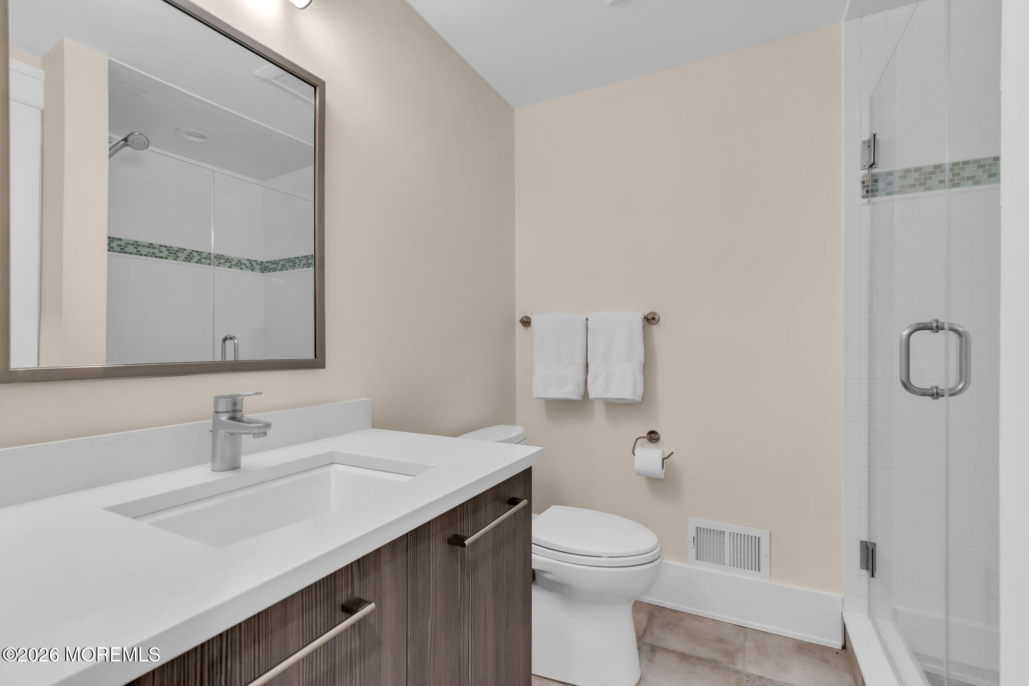 218 Worthington Avenue Spring Lake, NJ 07762 - Photo 43 of 51 a bathroom with a sink a toilet and a mirror