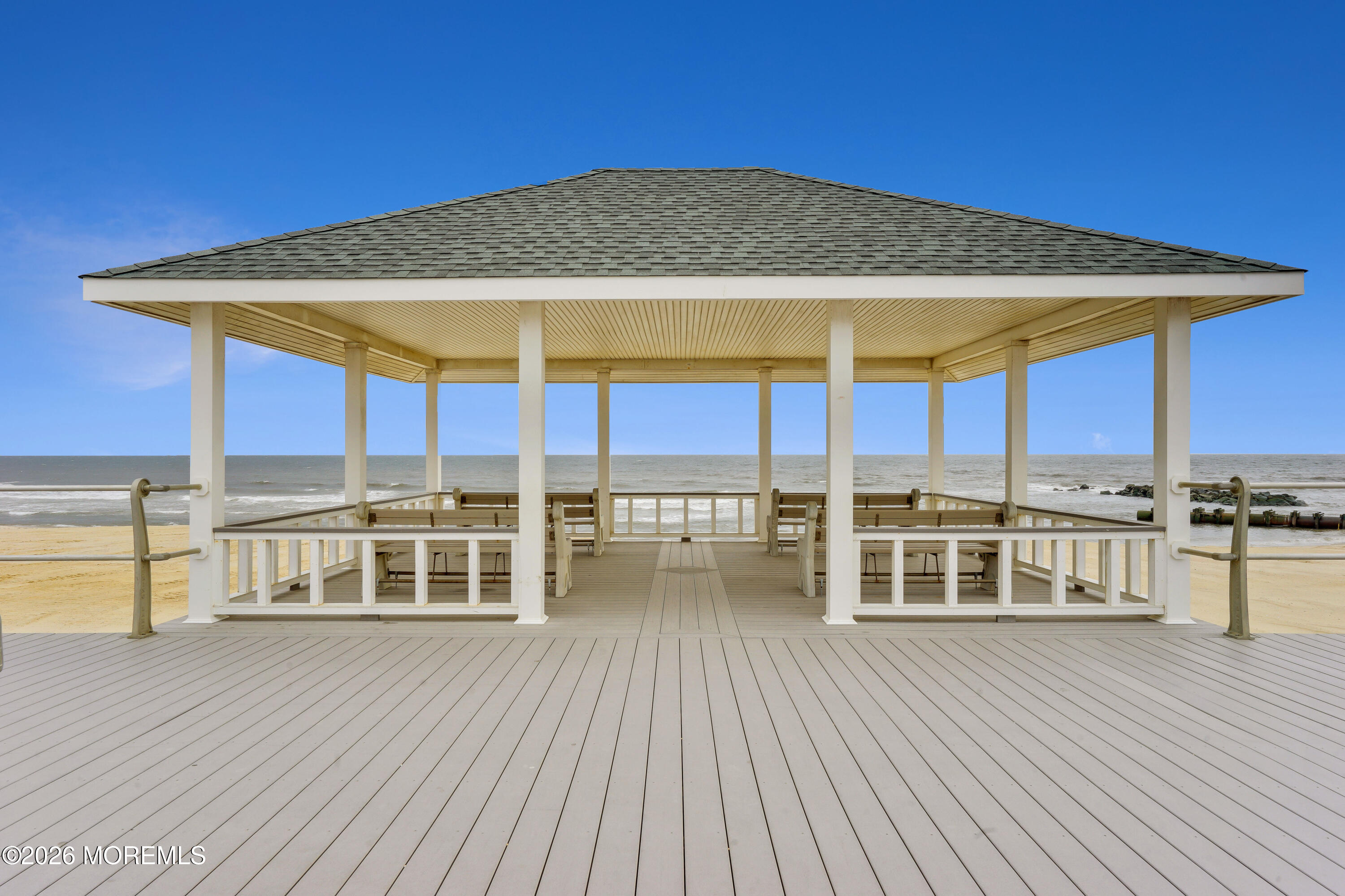 218 Worthington Avenue Spring Lake, NJ 07762 - Photo 50 of 51 an outdoor view with a large swimming pool and sitting area