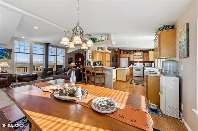 a spacious bathroom with a tub double sink and mirror