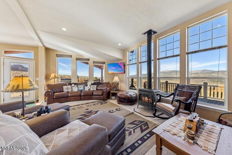 231 Atcheson Yerington, NV 89447 - Photo 16 of 30 a living room with furniture and a large window