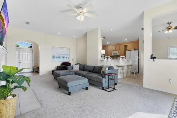 a dining room with furniture and window