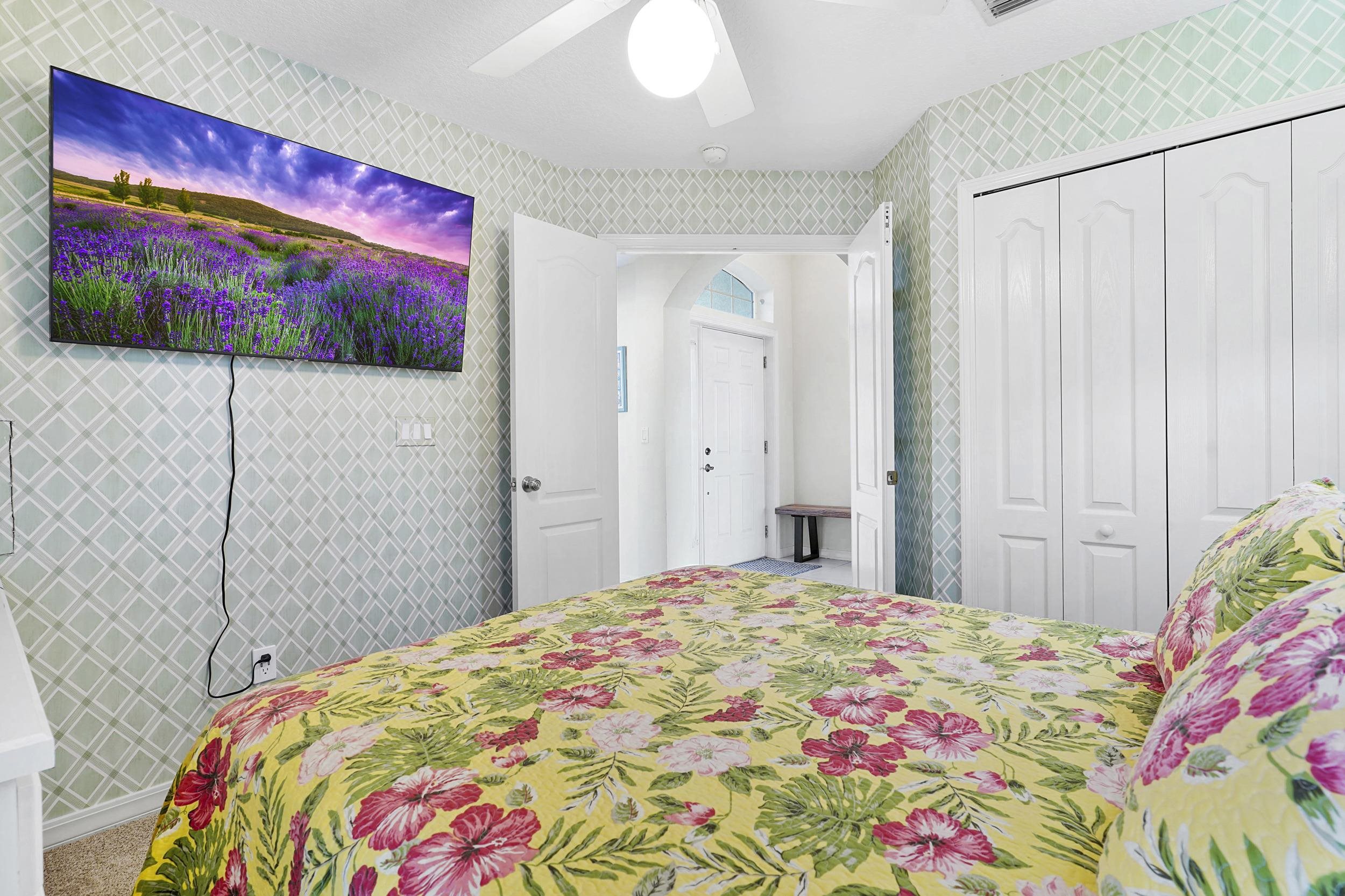 338 South Ocean Trace Road St. Augustine, FL 32080 - Photo 20 of 41 a bedroom with a bed and a painting on the wall