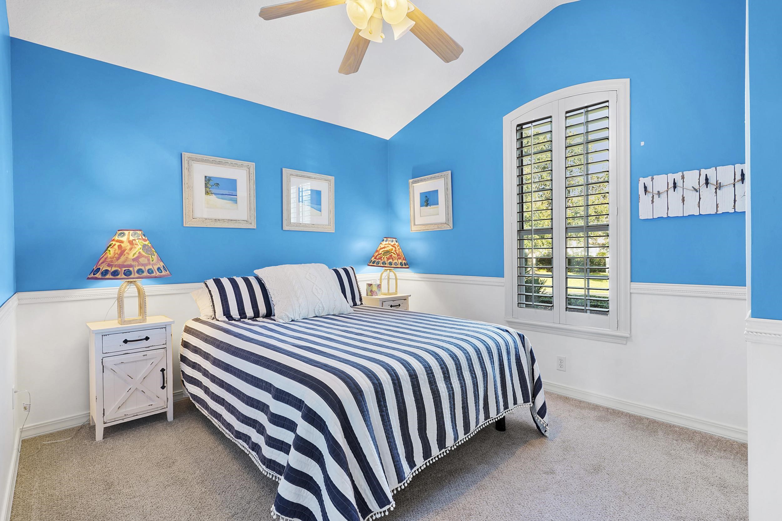 338 South Ocean Trace Road St. Augustine, FL 32080 - Photo 21 of 41 a bedroom with a bed and a window