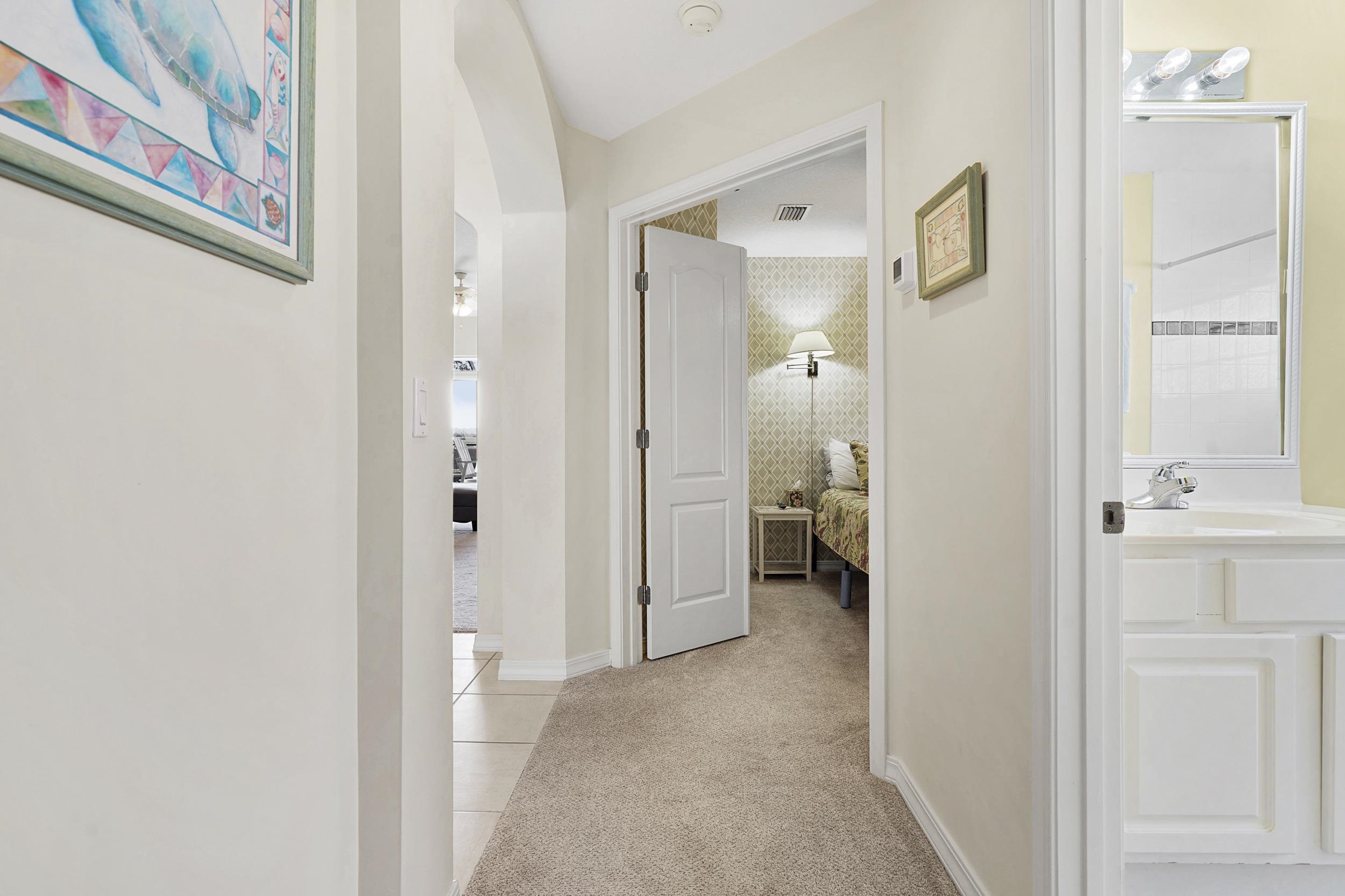 338 South Ocean Trace Road St. Augustine, FL 32080 - Photo 23 of 41 a view of a bathroom from a hallway