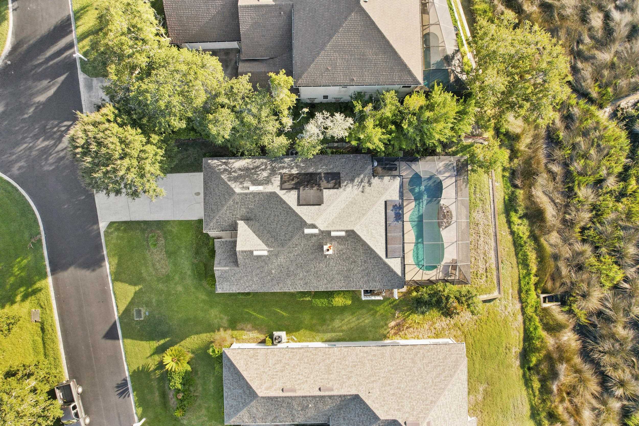 338 South Ocean Trace Road St. Augustine, FL 32080 - Photo 4 of 41 a front view of a house with a yard and fountain