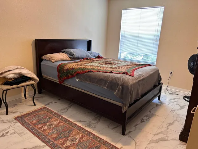 a room with table closet and a mirror