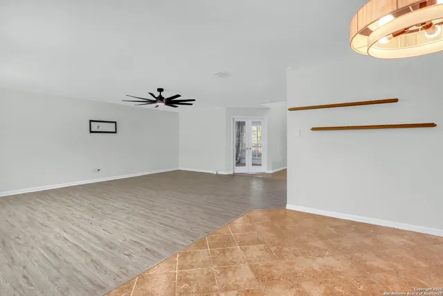 a spacious bathroom with a bathtub and a shower