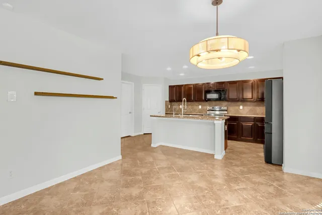 a view of a kitchen with a stove