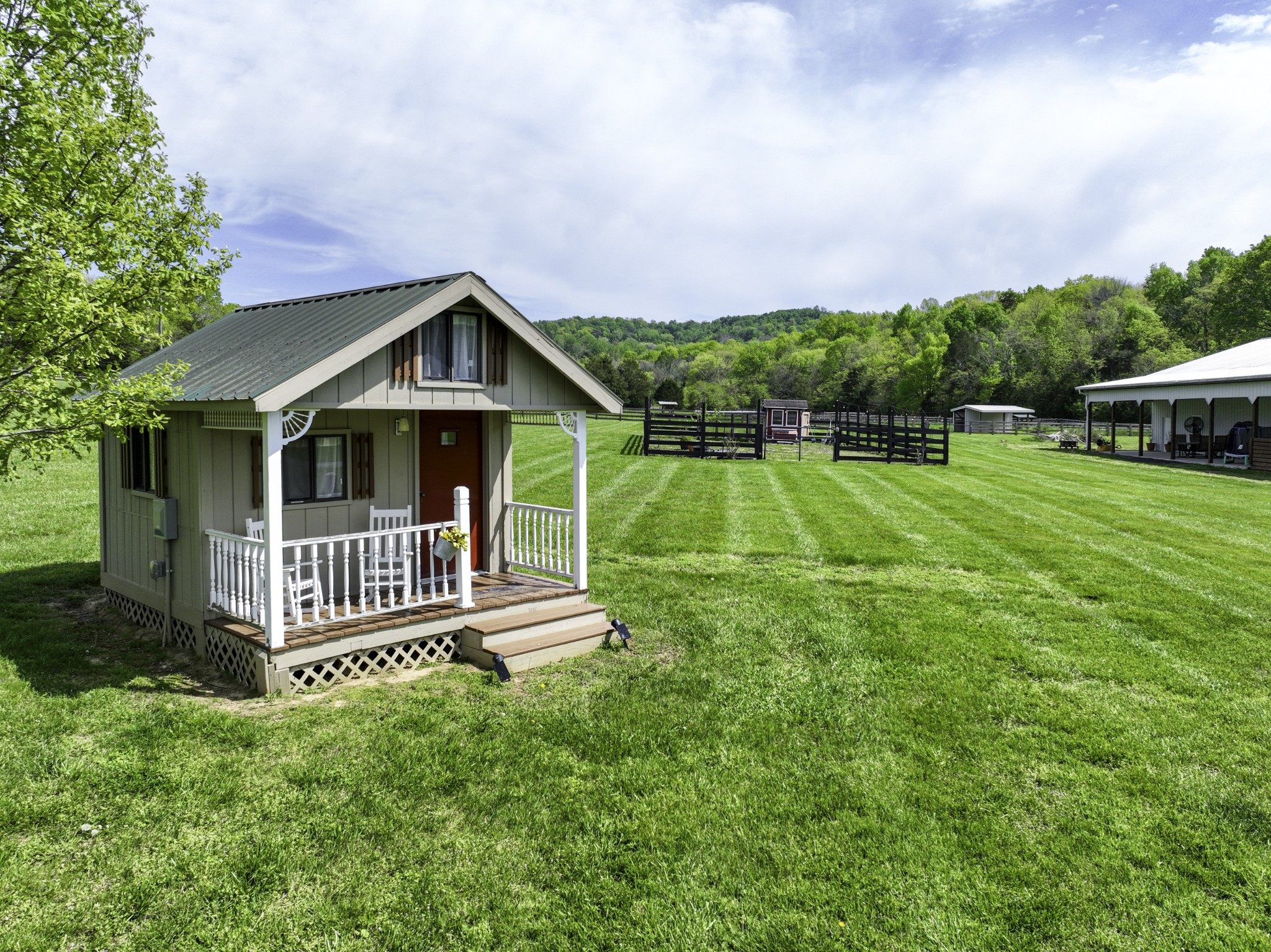 6865 Flat Creek Road College Grove, TN 37046 - Photo 29 of 66 a front view of a house with a yard