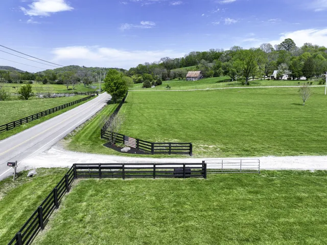a view of a house with a big yard