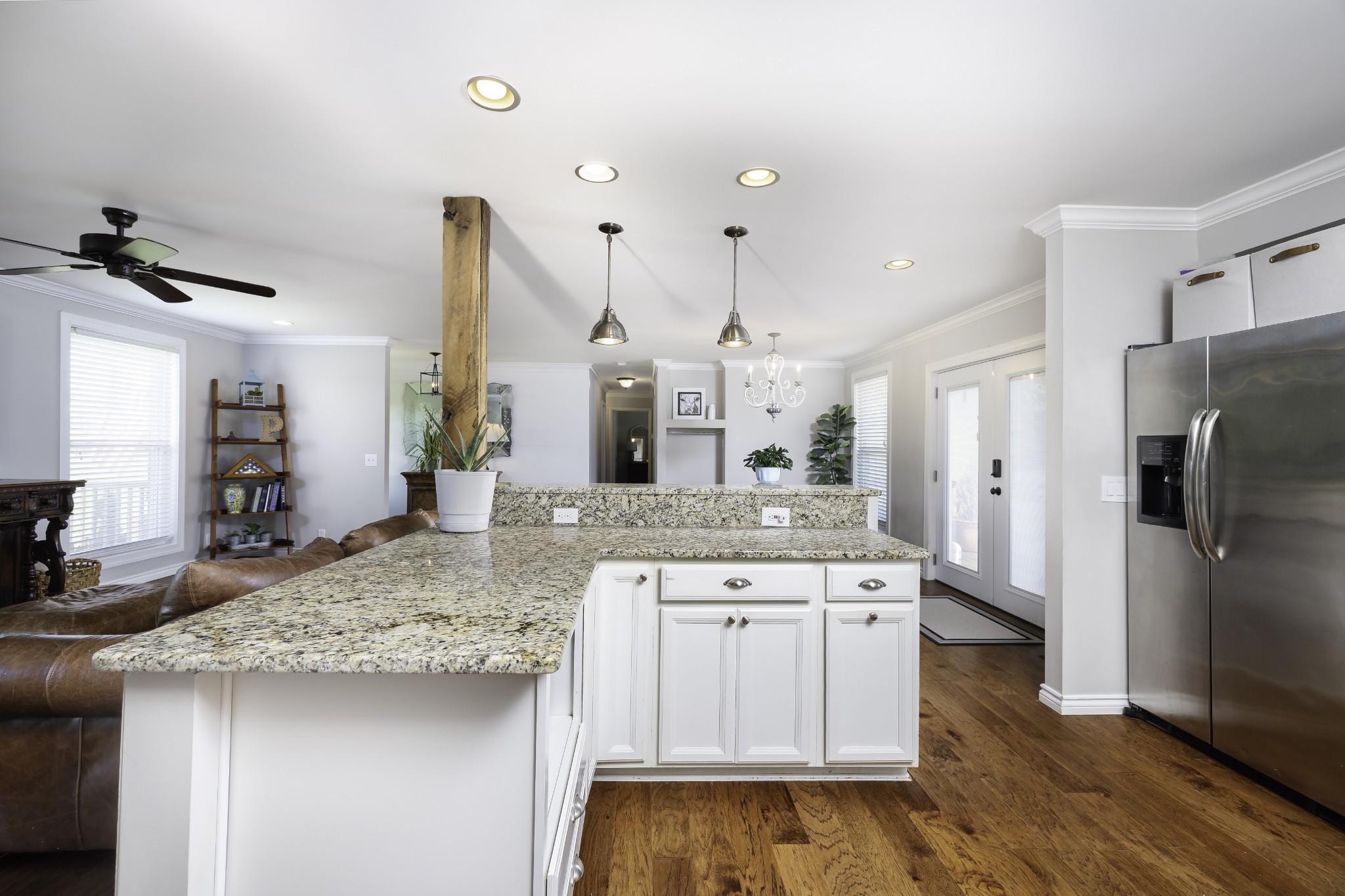 6865 Flat Creek Road College Grove, TN 37046 - Photo 53 of 66 a kitchen with a sink refrigerator and microwave