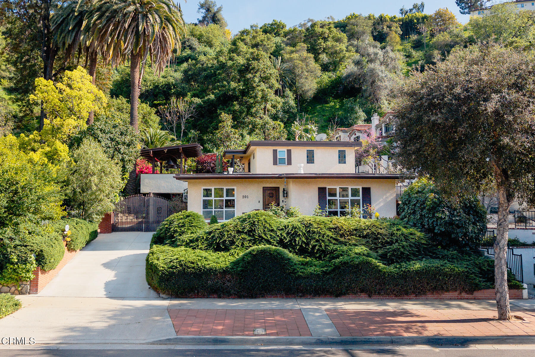 a house view with a garden space