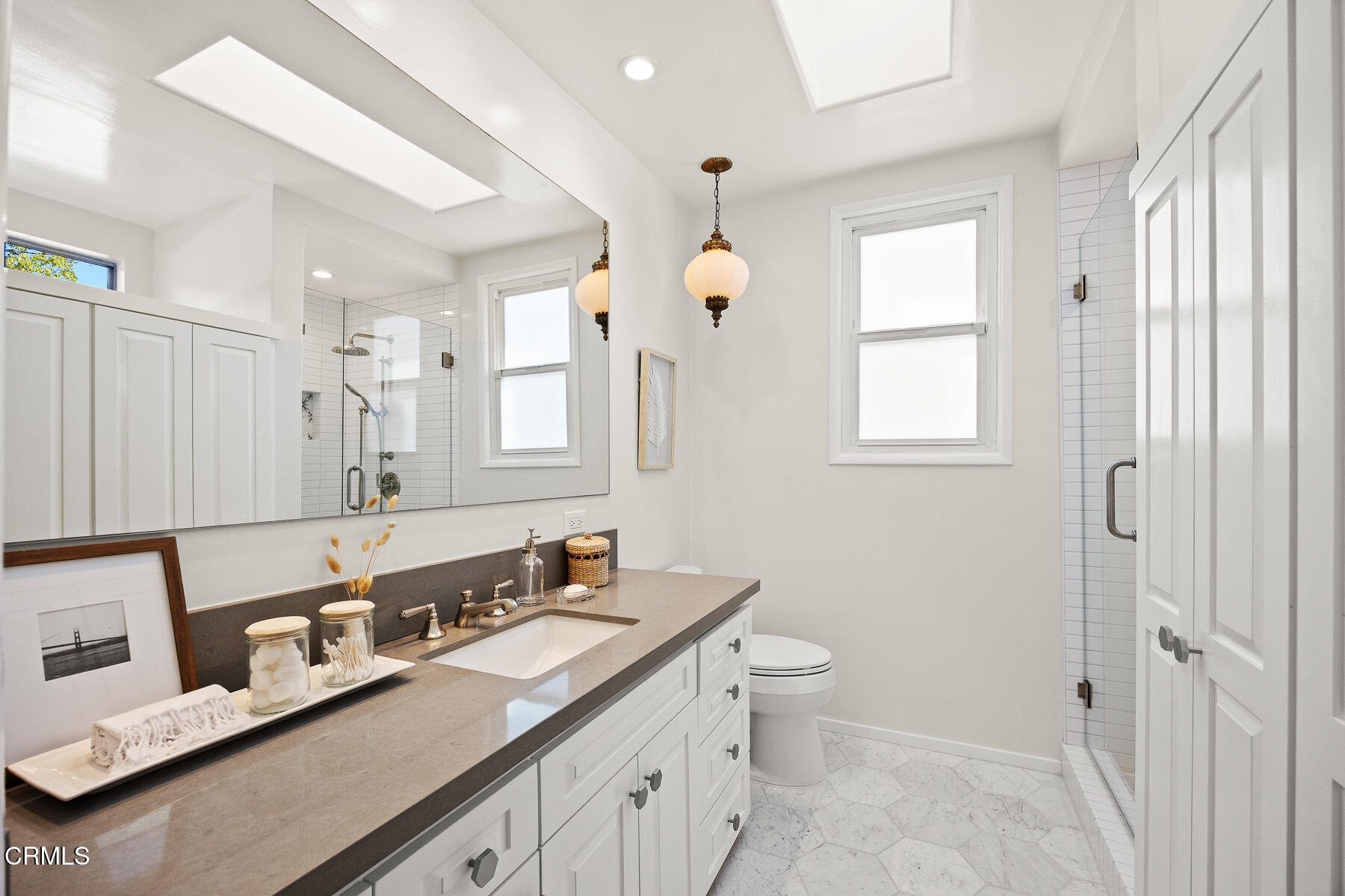 201 Monterey Road South Pasadena, CA 91030 - Photo 14 of 60 a bathroom with a granite countertop sink mirror and double