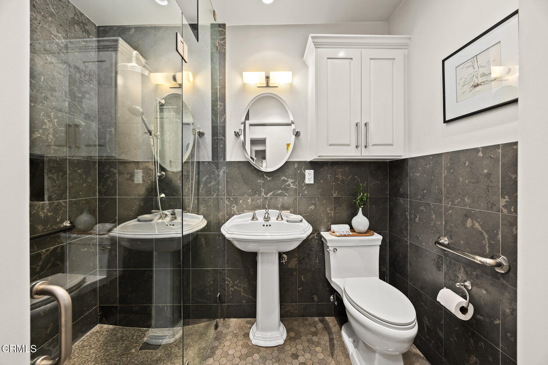 201 Monterey Road South Pasadena, CA 91030 - Photo 23 of 60 a bathroom with a toilet sink and mirror