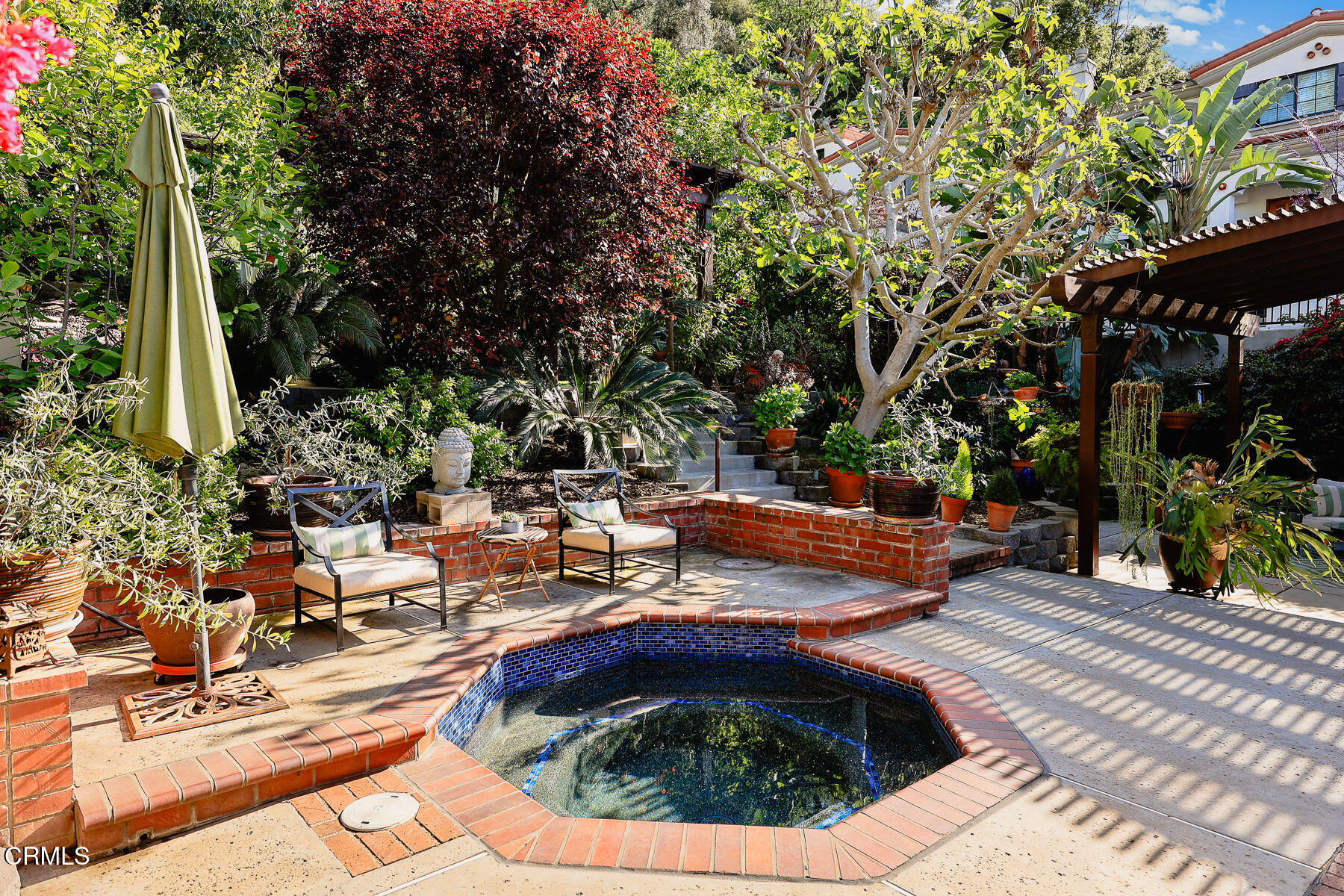 201 Monterey Road South Pasadena, CA 91030 - Photo 33 of 60 a view of swimming pool with lawn chairs and plants