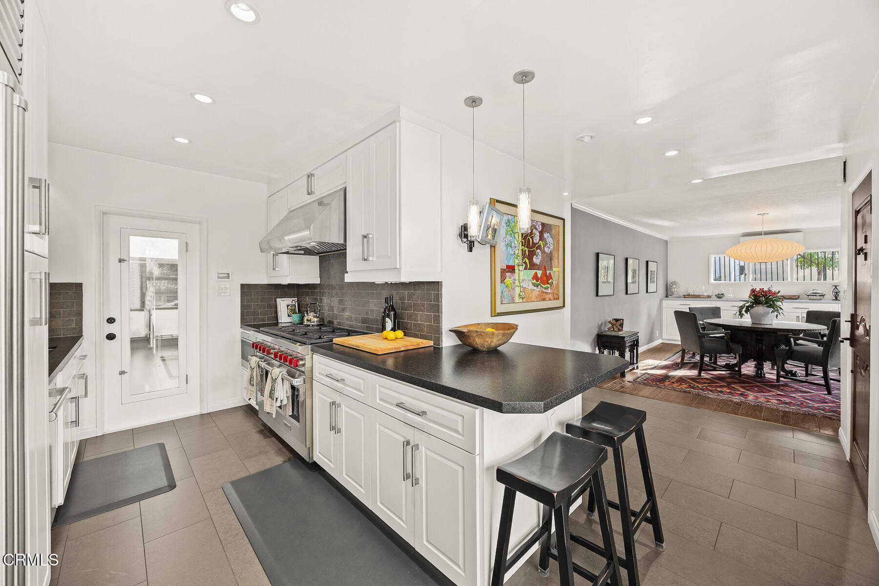 201 Monterey Road South Pasadena, CA 91030 - Photo 5 of 60 a kitchen with stainless steel appliances kitchen island granite countertop a sink and cabinets
