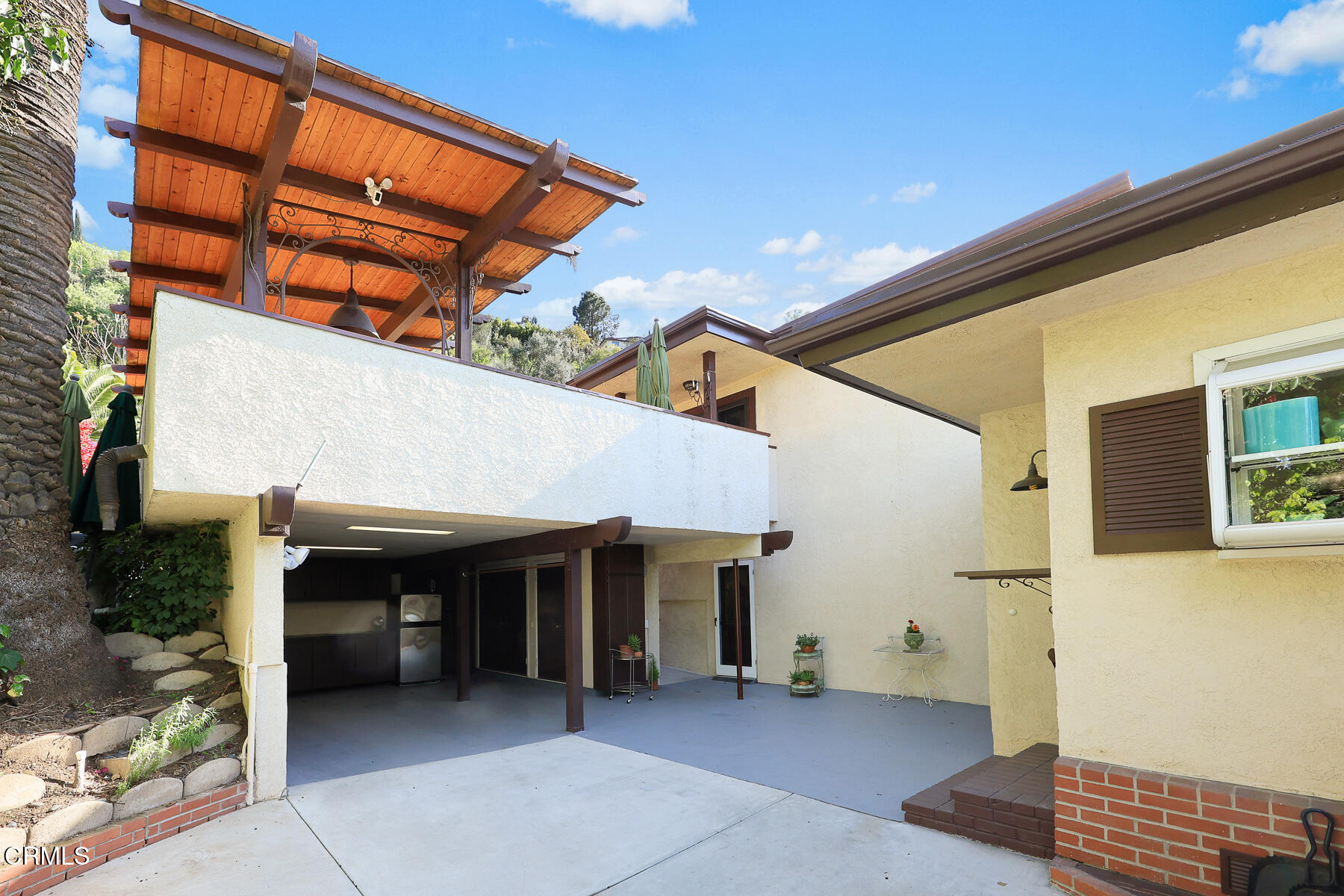 201 Monterey Road South Pasadena, CA 91030 - Photo 52 of 60 a view of a white house with a sink and a large window