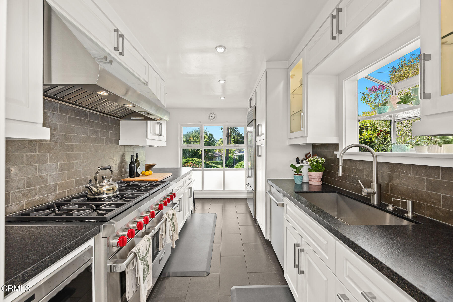 201 Monterey Road South Pasadena, CA 91030 - Photo 7 of 60 a kitchen with sink stove and window