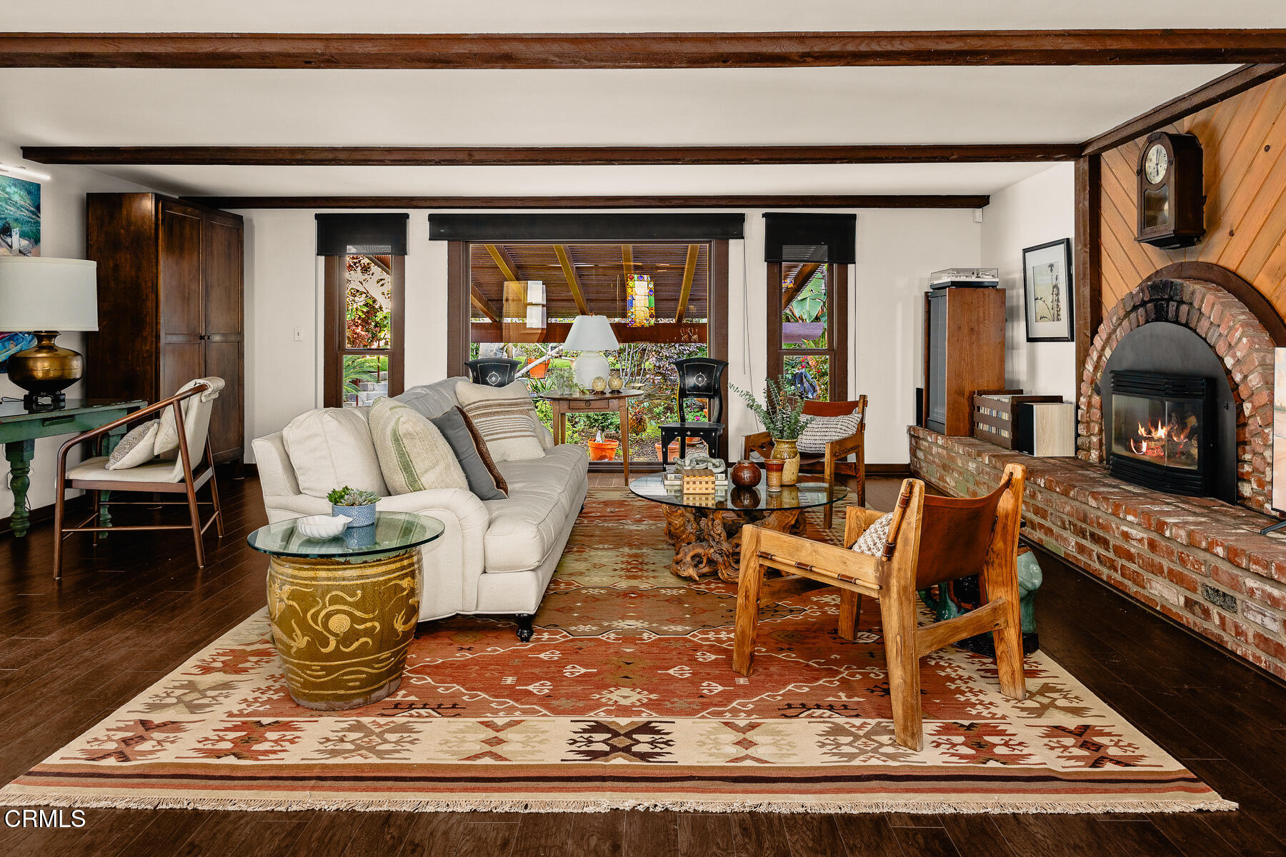 201 Monterey Road South Pasadena, CA 91030 - Photo 10 of 60 a living room with furniture a rug and a fireplace