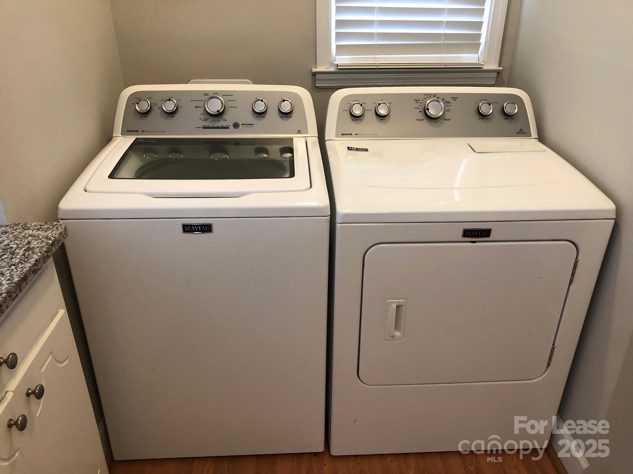 5925 Quail Hollow Road, Unit D Charlotte, NC 28210 - Photo 8 of 17 a utility room with dryer and washer