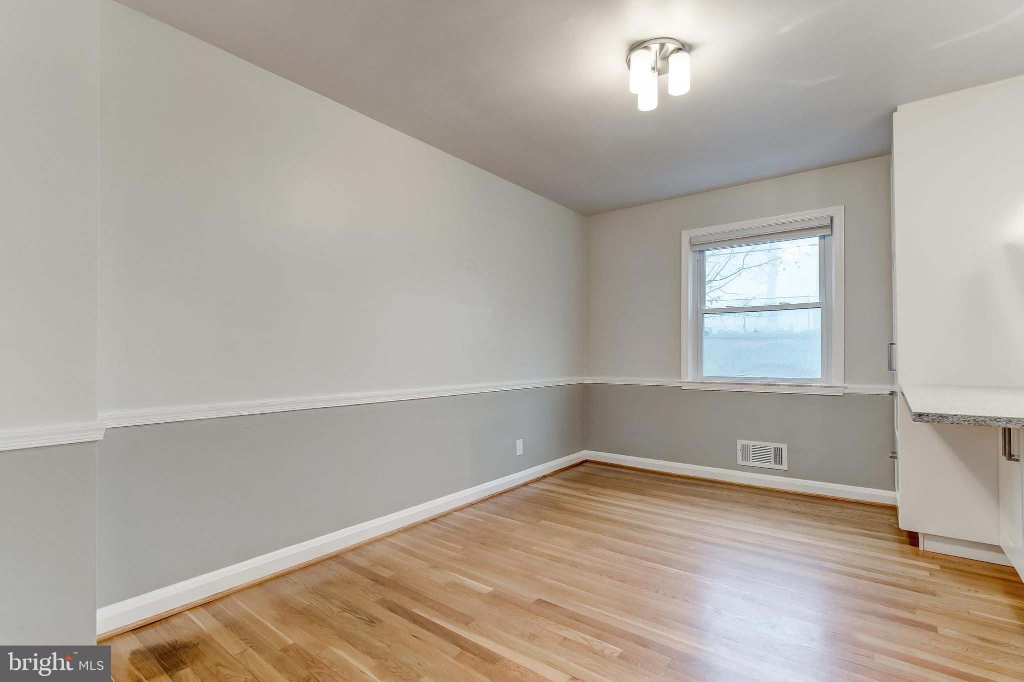 73 Garden Ridge Road Baltimore, MD 21228 - Photo 10 of 40 Dining room with chair rail molding