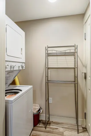an aerial view of a house with a swimming pool patio and outdoor seating
